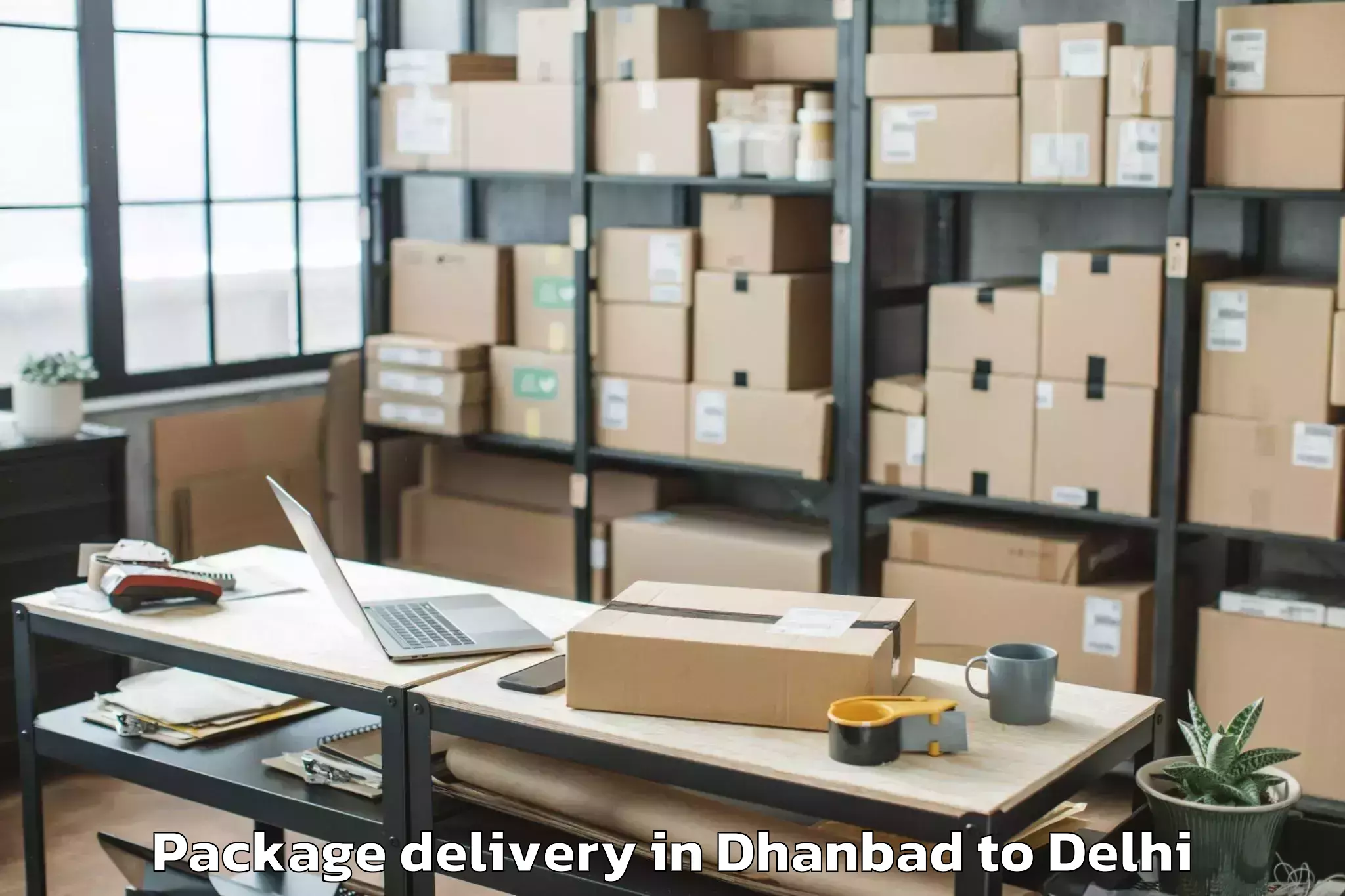 Book Dhanbad to C R R I Package Delivery